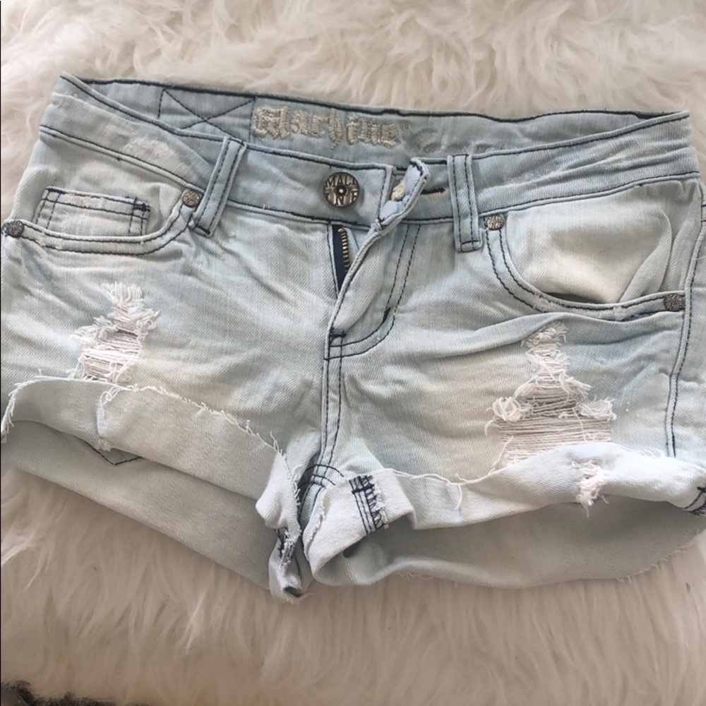 Distressed denim cut off shorts